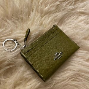 Brand new fun and funky green Coach keychain wallet!